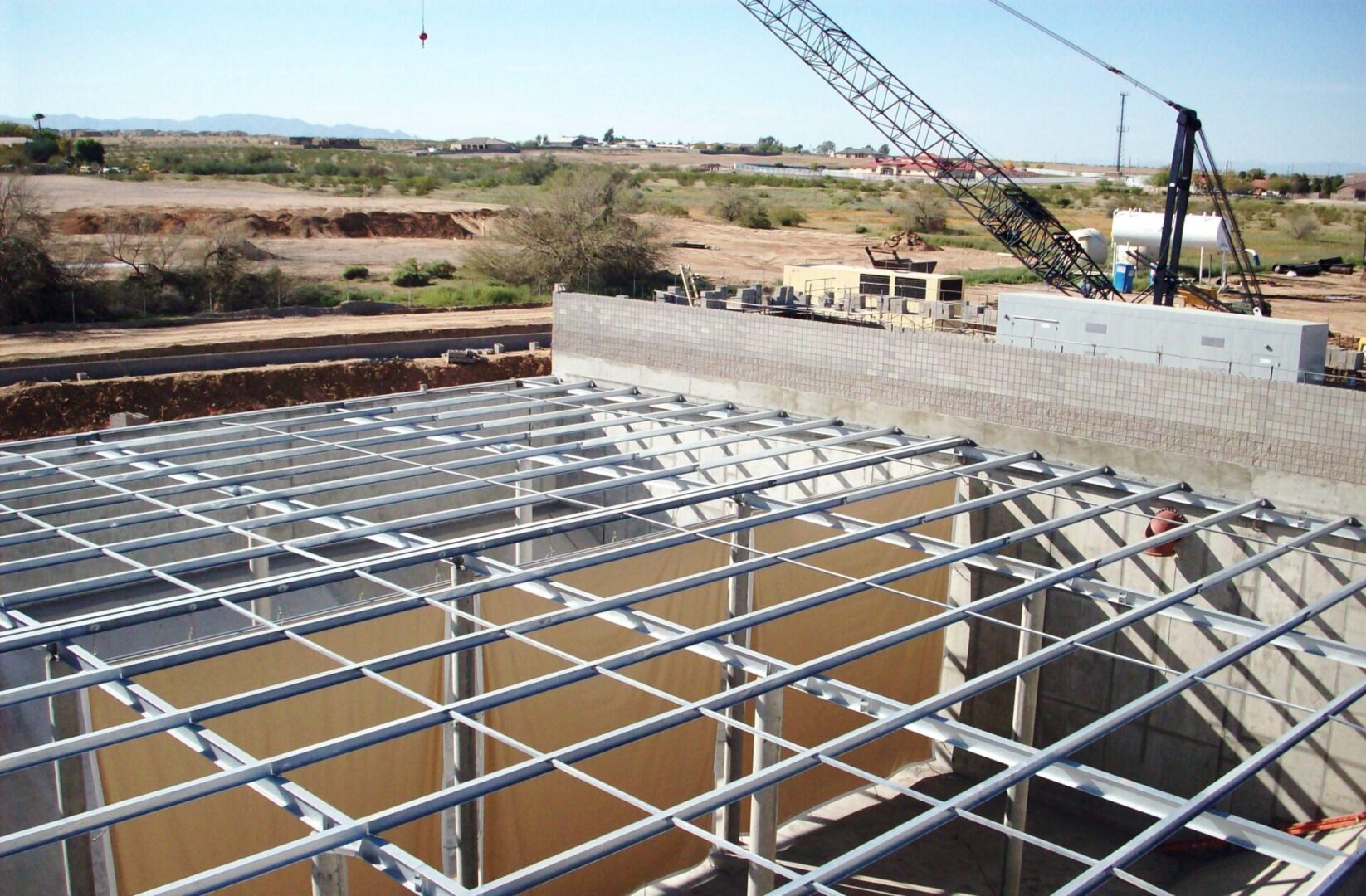 A building under construction with steel frame.
