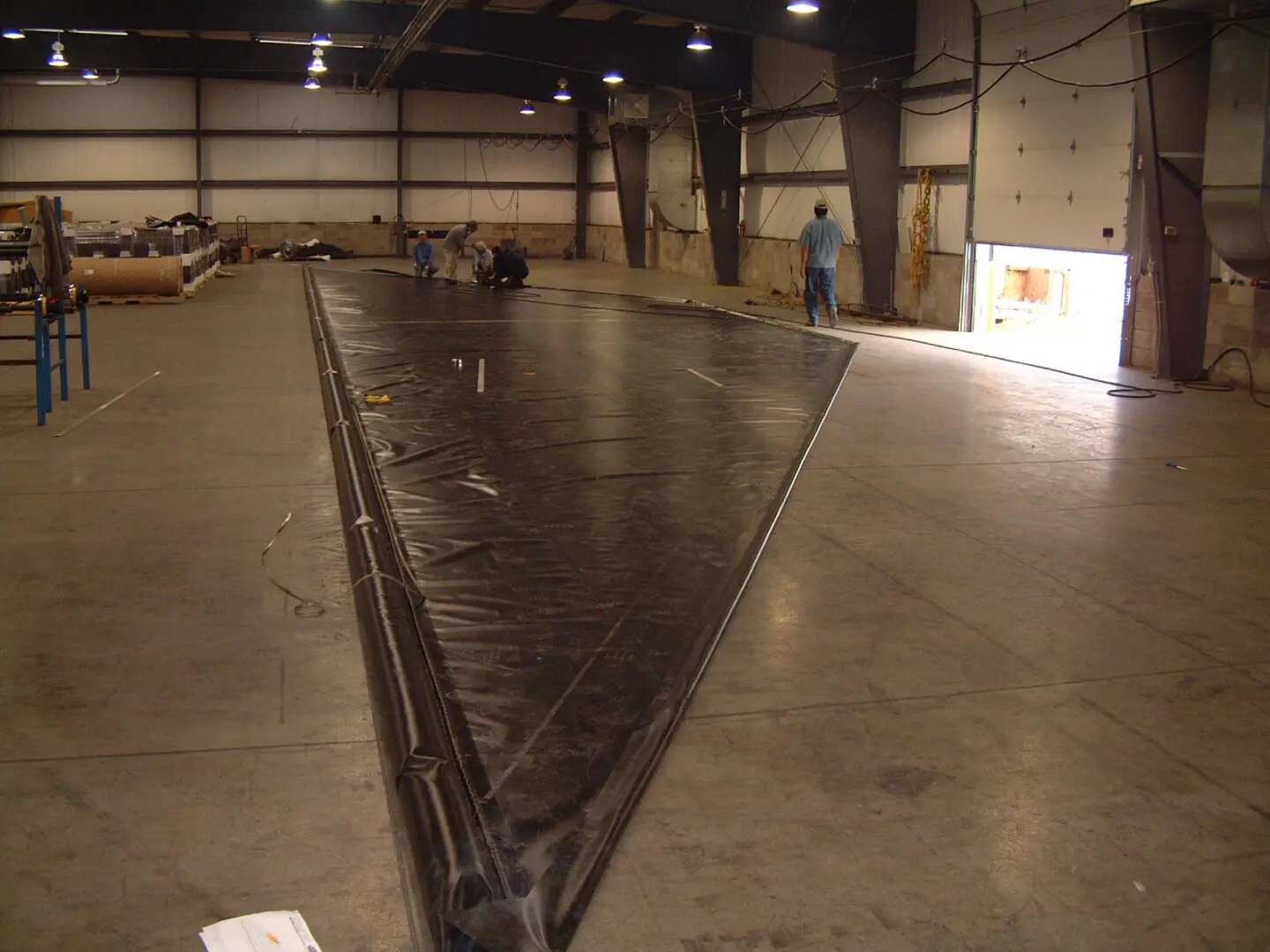 A large metal ramp in an industrial building.