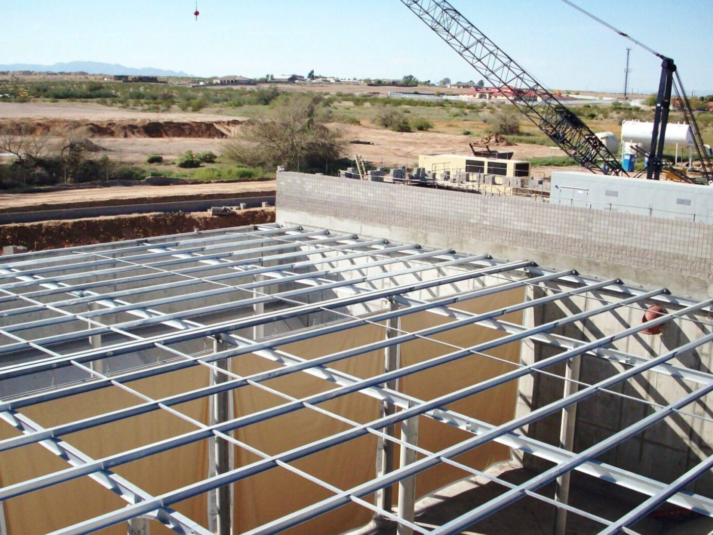 A building under construction with steel frame.